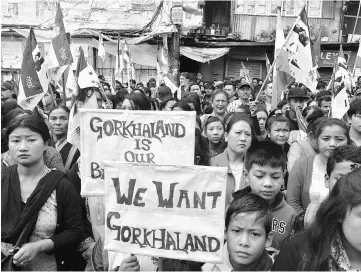  ??  ?? File photo shows Indian supporters of the Gorkha Janmukti Morcha (GJM) taking part in a protest amid a strike called by the GJM in Darjeeling. — AFP photo