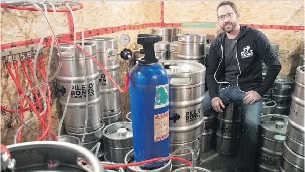  ?? TROY FLEECE ?? Glen Valgardson, owner of Pile O’ Bones brewery in Regina, believes canning his beer will give his brew more exposure to buyers.