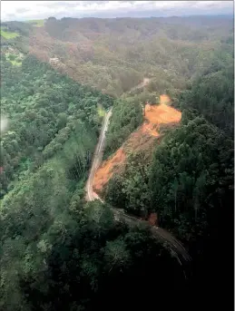  ??  ?? SLIP: Aerial view of the slip which has closed State Highway 11 at Lemon’s Hill since February 13. PHOTO / NZTA