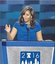  ?? Carolyn Cole Los Angeles Times ?? FIRST LADY Michelle Obama reminded Democrats in Philadelph­ia of whom they are united in loathing.