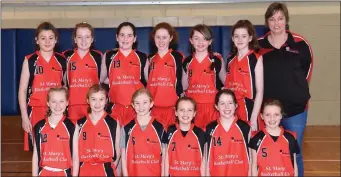  ??  ?? The St Mary’s team that played Glenbeigh Falcons in the U-12 Division 1 Cup final with manager Sonya Kerin in the Presentati­on Gym, Killarney on Sunday.