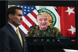  ?? MANUEL BALCE CENETA — THE ASSOCIATED PRESS FILE ?? Gen. Frank McKenzie, commander of U.S. Central Command, appears on screen as he speaks from MacDill Air Force Base in Tampa, Fla., during a virtual briefing moderated by Pentagon spokesman John Kirby at the Pentagon in Washington.