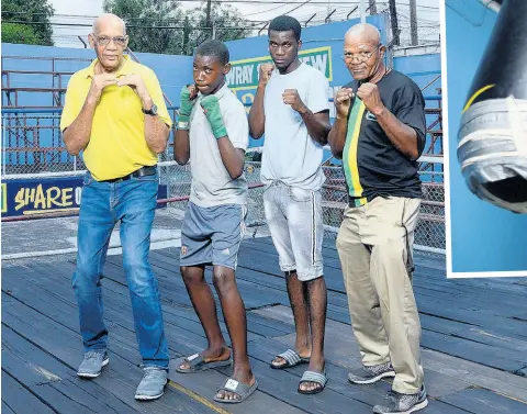  ??  ?? From left: Kingsley Goodison, manager, Stanley Couch Gym; Amateur Boxer Raheem Haye; Profession­al Boxer Daniel Hylton; and Coach Lindel ‘Coach Sugar’ Wallace, strike a pose at the Stanley Couch Gym on East Queen Street in downtown Kingston.