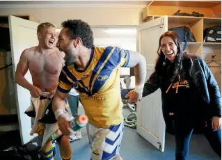  ?? DAVID WHITE / STUFF ?? Labour’s new leader Jacinda Ardern mingles with players at the Mt Albert Rugby League Club and encourages the party faithful at the electorate office.