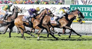  ?? PHOTO: RACE IMAGES CHCH ?? Nothing in it . . . Son Of Maher (outer) and Shadows Cast cannot be separated at the end of yesterday’s group 2 Coupland’s Bakeries Mile at Riccarton. Boots N All, Watch This Space (obscured) and Beefeater follow.