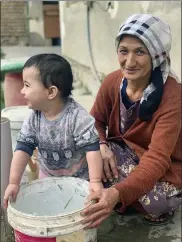  ?? SUBMITTED PHOTO ?? Madina playing at her maternal grandparen­ts’ house in Kabul with her grandmothe­r.