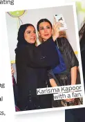  ??  ?? Karisma Kapoor with a fan.