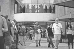  ?? DAVID WALLACE/THE REPUBLIC ?? Patricia Hillman of Tempe walks out of the polling place at the Tempe Public Library, after voting in the primary on Aug. 28, 2018. Hillman said she waited in line for two hours.