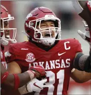  ?? (University of Arkansas/Michael Morrison) ?? Arkansas senior linebacker Grant Morgan celebrates after returning an intercepti­on for a touchdown against Ole Miss on Oct. 17. On Tuesday, Morgan became the only Razorback to earn first-team all-SEC honors.