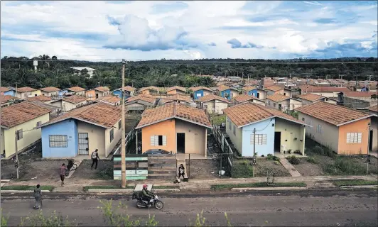  ?? [JABIN BOTSFORD/THE WASHINGTON POST PHOTOS] ?? The constructi­on of a dam displaced tens of thousands of rural residents in Altamira. Many ended up in planned communitie­s like these, some of which transforme­d into ghettos rife with drugs and crime.