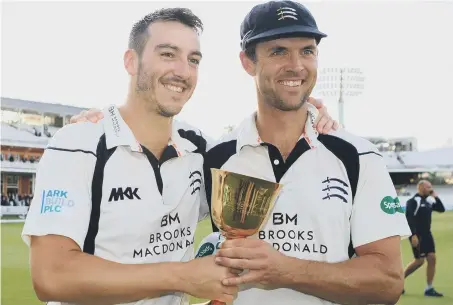  ??  ?? Middlesex’s James Franklin (right) and Toby Roland-Jones celebrate after winning the County Championsh­ip in 2016.