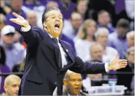  ?? MICHAEL CONROY/ THE ASSOCIATED PRESS ?? Kentucky coach John Calipari gestures from the sideline during the second half of a second-round game against Wichita State during the NCAA Tournament on Sunday in Indianapol­is. Kentucky defeated Wichita State 65-62.