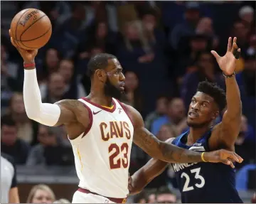  ?? File, Jim Mone / AP ?? Going into Thursday’s game, Cleveland’s LeBron James (left) was only 126 points shy of 30,000 for his career.