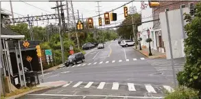  ?? Christian Abraham / Hearst Connecticu­t Media ?? A federal grant funded a study conducted by DOT and UConn looks to decrease pedestrian-and-car crashes by changing the type of crosswalk signal.