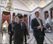  ?? J. SCOTT APPLEWHITE — THE ASSOCIATED PRESS FILE ?? House Speaker Mike Johnson, R-LA., walks through Statuary Hall on Feb. 6as lawmakers gather in the House chamber to vote on the articles of impeachmen­t against Homeland Security Secretary Alejandro Mayorkas for failures on the U.s.-mexico border at the Capitol in Washington.