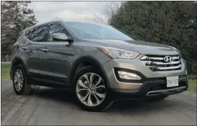  ??  ?? The 2013 Hyundai Santa Fe Sport SE, left, outdoes the Ford on interior space while the 2013 Ford Escape SEL AWD gets top points for its performanc­e behind the wheel.