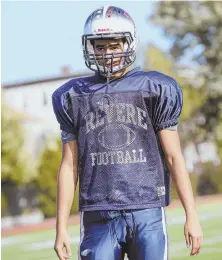  ?? STAFF PHOTOS BY NICOLAUS CZARNECKI ?? TEE TIME: Rayan Riazi gets ready to kick out of the hold of a Revere teammate during practice this week. Riazi’s special teams contributi­ons have been a big part of the Patriots’ 3-2 start to the season.