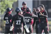  ?? Pawan Singh/ The National ?? UAE’s Khushi Sharma, right, celebrates the wicket of Ngawang Choden in their Women’s T20 World Cup qualifier