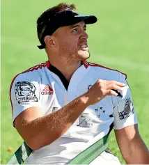  ?? PHOTO: GETTY IMAGES ?? Israel Dagg stretches out with a big band at Crusaders training at Rugby Park yesterday.