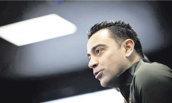  ?? // JAVI FERRÁNDIZ ?? Xavi compareció ayer en la sala de prensa de la Ciutat Esportiva Joan Gamper