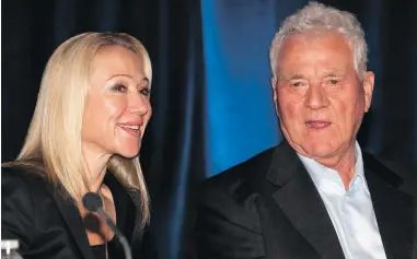  ?? FRANK GUNN, THE CANADIAN PRESS ?? Magna Internatio­nal Inc. chairman Frank Stronach and executive vice-chair Belinda Stronach chat at the company’s annual general meeting in Markham, Ont., on May 6, 2010.