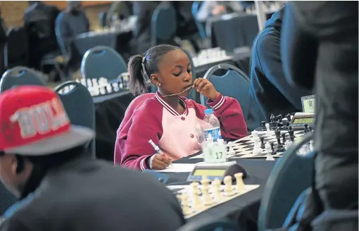  ?? /Daylin Paul ?? Early start: Vangile Nhlapo of the Ekurhuleni Chess Associatio­n will represent SA at the African Youth Chess Championsh­ips in Egypt in December. Nhlapo is one of the few exceptions among black pupils who need financial assistance to participat­e in...