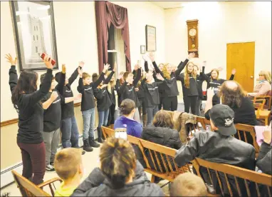  ?? Ben Lambert / Hearst Connecticu­t Media ?? The Pearson Show Choir performs Tuesday at a meeting of the Winsted Board of Education.