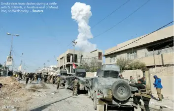  ?? — Reuters ?? Smoke rises from clashes during a battle with IS militants, in frontline east of Mosul, Iraq, on Wednesday.