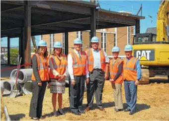  ?? CONTRIBUTE­D PHOTO ?? At the check presentati­on to benefit the new Children’s Hospital at Erlanger are, from left, Ellie LaPorte, Gearhiser, Peters, Elliott & Cannon, PLLC; Julie Taylor, chief developmen­t officer and president, Erlanger Health System Foundation­s; R. Wayne...