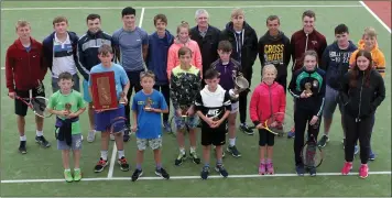  ??  ?? Prize-winners in the Parks Tennis competitio­n with organiser Austin Pender receiving their prizes in the Wexford Harbour Boat and Tennis Club.