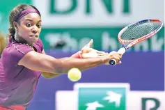  ?? — AFP photo ?? Sloane Stephens of the US hits a return against Germany’s Angelique Kerber during their singles match at the WTA Finals tennis tournament in Singapore on October 26, 2018.