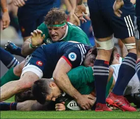  ??  ?? DECISIVE: (Clockwise from top left) Conor Murray powers over to score the only try of the game yesterday; Garry Ringrose tries to punch a gap through the French defence; but Rob Kearney finds no way past the combinatio­n of Yoann Maestri and Gael Fickou...