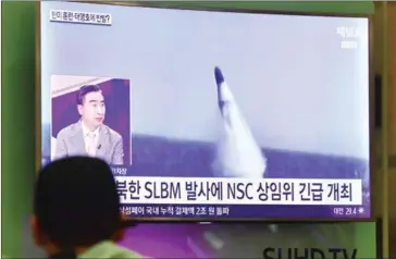 ?? JUNG YEON-JE/AFP ?? A man watches a television news broadcast at Incheon airport, west of Seoul, yesterday showing file footage of a North Korean missile launch.