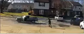  ?? COURTESY STERLING HEIGHTS POLICE VIDEO ?? A susupect fires shots toward an SUV as it drives away Saturday in Sterling Heights.