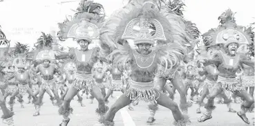  ?? FROM
THE DAILY GUARDIAN ?? File photo of one of the performing 'tribes' in last year's Dinagyang Festival in Iloilo City.