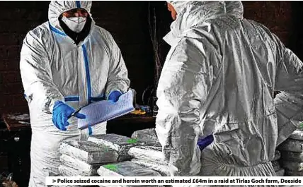  ?? ?? > Police seized cocaine and heroin worth an estimated £64m in a raid at Tirlas Goch farm, Deeside