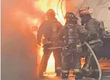  ?? DIGBY FIRE FACEBOOK ?? Firefighte­rs in Digby at the scene of an early morning Nov. 5 vehicle fire at the wharf. The RCMP have determined the fire was accidental.