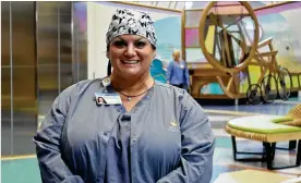  ?? CONTRIBUTE­D ?? Christina Buchanan of Germantown is a surgical technologi­st at Dayton Children’s Hospital. She went back to college af ter being laid offff from a medical billing company and was hired by the hospital af ter earning her associate’s degree.