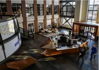  ?? ERIN CLARK / GLOBE STAFF ?? The lobby of athenaheal­th in Watertown. The health care software company announced Thursday 178 positions would be cut from its ranks.