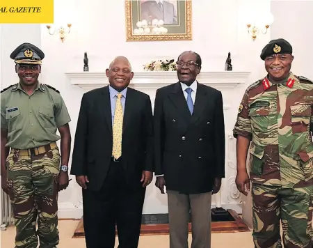  ?? AFP PHOTO / ZBC ?? Zimbabwe President Robert Mugabe, second from right, poses alongside Zimbabwe Defence Forces Commander General Constantin­o Chiwenga, right, and South African envoys at State House in Harare. Chiwenga is the head of the armed forces who ordered the...