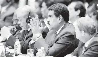  ??  ?? Venezuela’s President Nicolas Maduro (C) attends the opening of the 7th Summit of Heads of State for the Associatio­n of Caribbean States in Havana, Cuba, June 4, 2016. (Reuters/Alejandro Ernesto/Pool)