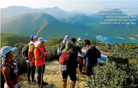  ??  ?? Hanging tough: the rigorous macLehose trail, used in the Oxfam trailwalke­r, crosses the mountainou­s
interior of Hong Kong. Here participan­ts are enjoying the panoramic view at tai Long Wan.