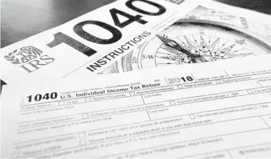  ?? KEITH SRAKOCIC/AP 2019 ?? The tax filing season will begin in mid-February this year so the IRS will have added time to update and test its systems to reflect late-year tax changes approved by Congress, including a second round of economic stimulus payments.