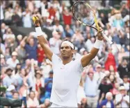  ?? Glyn Kirk / AFP / Getty Images ?? Rafael Nadal celebrates after beating Juan Martin del Potro in their quarterfin­al match Wednesday at Wimbledon.