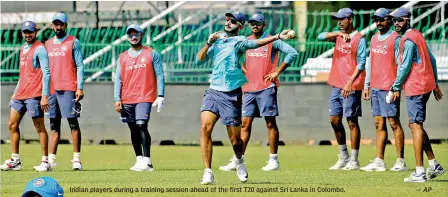  ?? — AP ?? Indian players during a training session ahead of the first T20 against Sri Lanka in Colombo.