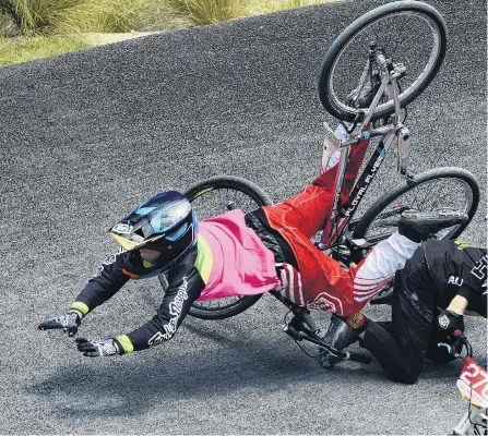  ??  ?? In a tangle . . . Dunedin’s Nic Butler (left) falls with Louis Hunt, of Cambridge, during a 1314 BMX cruisercla­ss race at the South Island Championsh­ips at Forrester Park over the weekend. Avoiding the crash is Christchur­ch’s JesseJames Green. At right: How the crash unfolded.