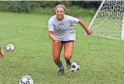  ?? ?? Kayla Sciortino, a junior, goes after the ball during a game of keepaway in a Freehold Township High School girls soccer preseason practice on Aug. 14.