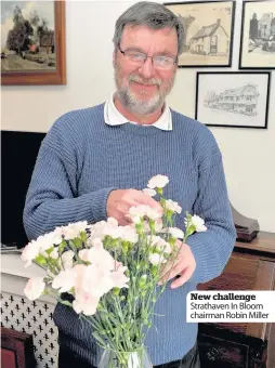  ??  ?? New challenge Strathaven In Bloom chairman Robin Miller