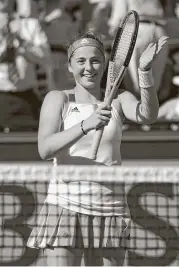  ?? Francois Xavier / AFP ?? Latvia’s Jelena Ostapenko celebrates her victory in the semifinals Thursday, making her the first unseeded French Open finalist since 1983.