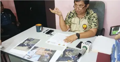  ?? ALDO NELBERT
BANAYNAL ?? NBI-Bohol District Office head lawyer Renan Oliva explains how the operation resulted in a shootout that
killed SPO1 Adonis Dumpit.